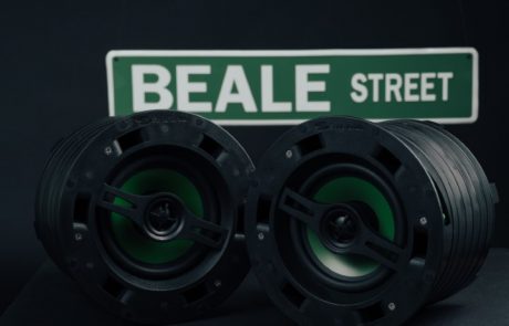 Two Beale Street Ceiling speakers in front of a Beale Street sign